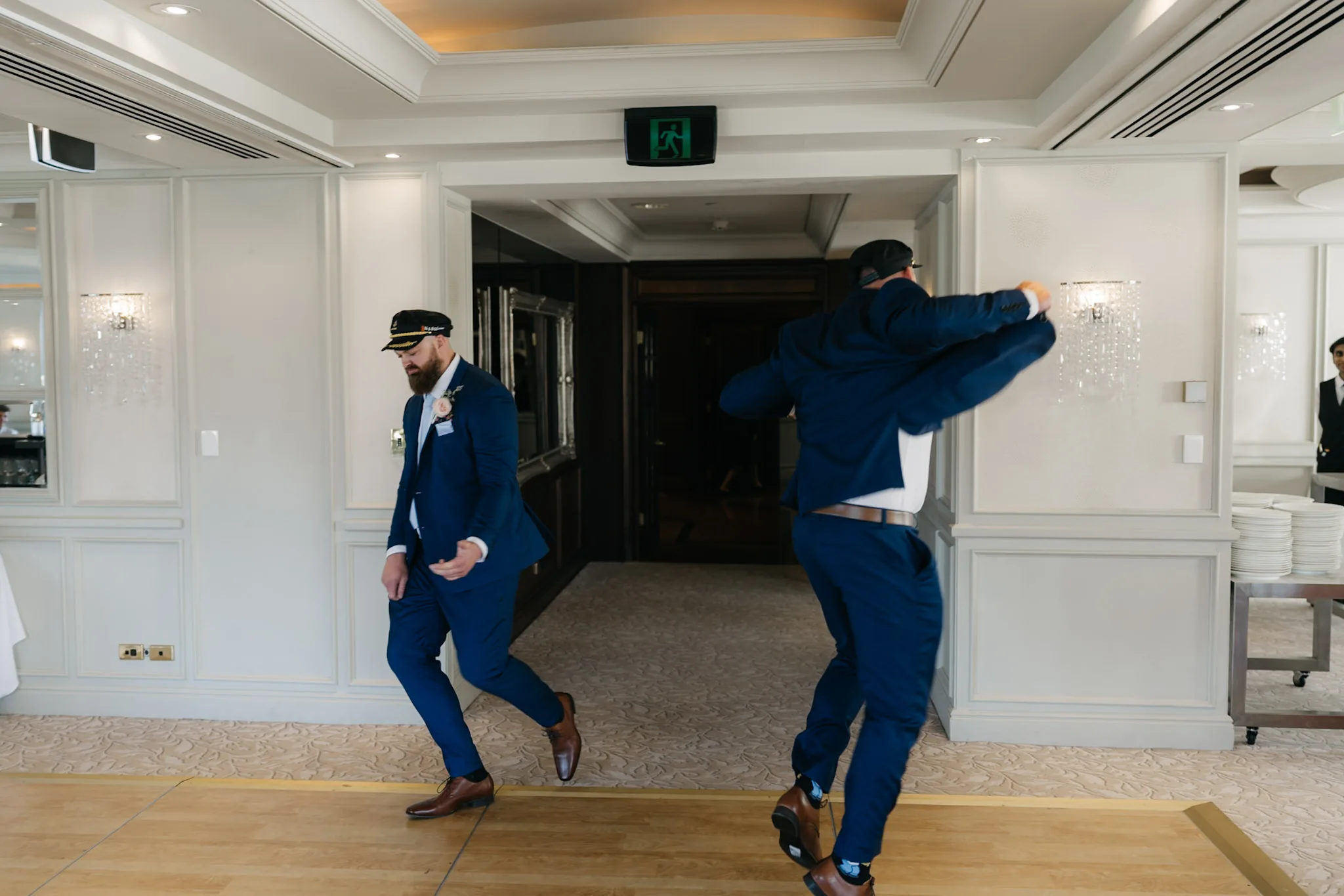 Groomsmen dancing their way into the reception