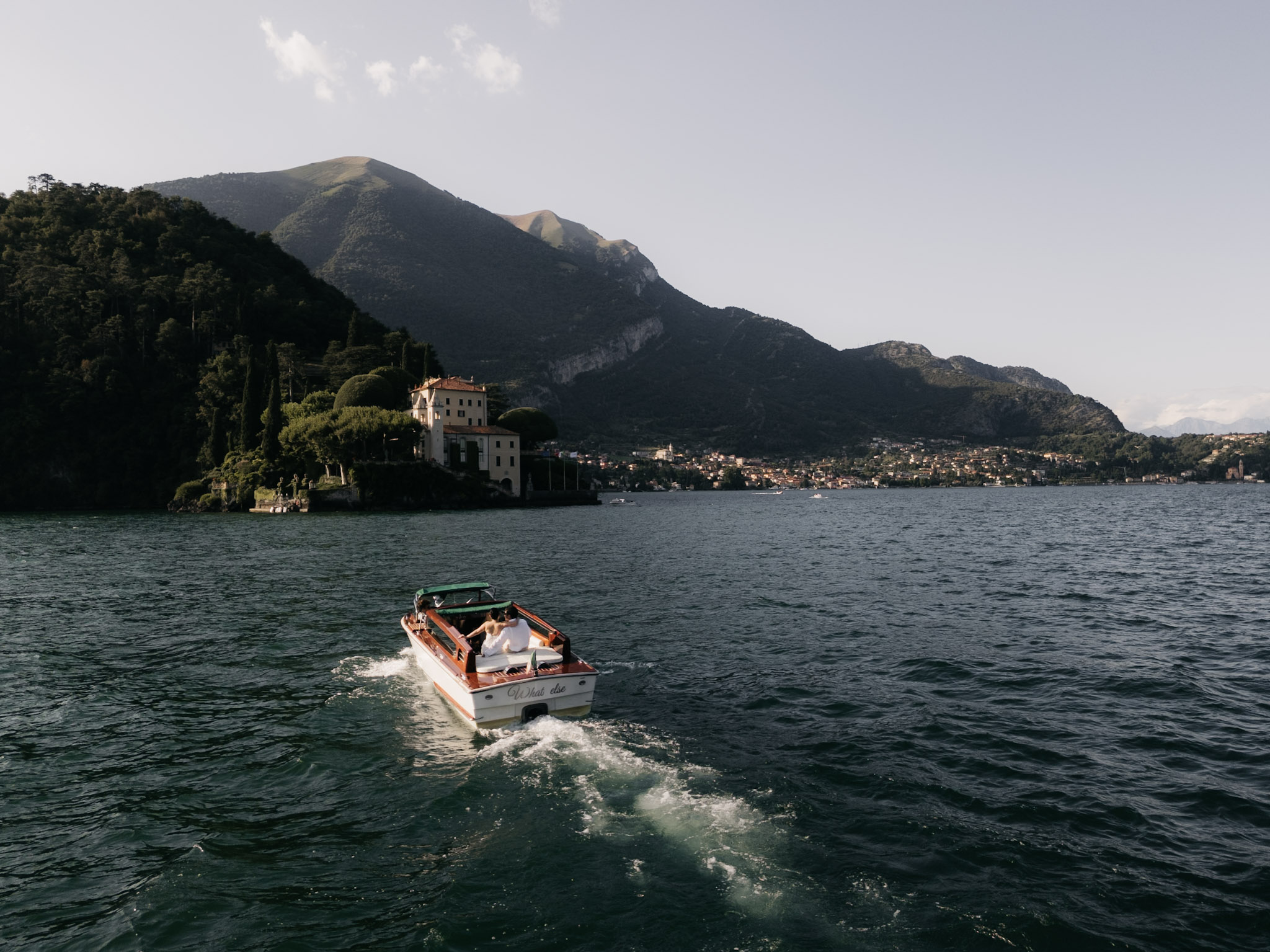A wide horizon view with the boat moving into the distance