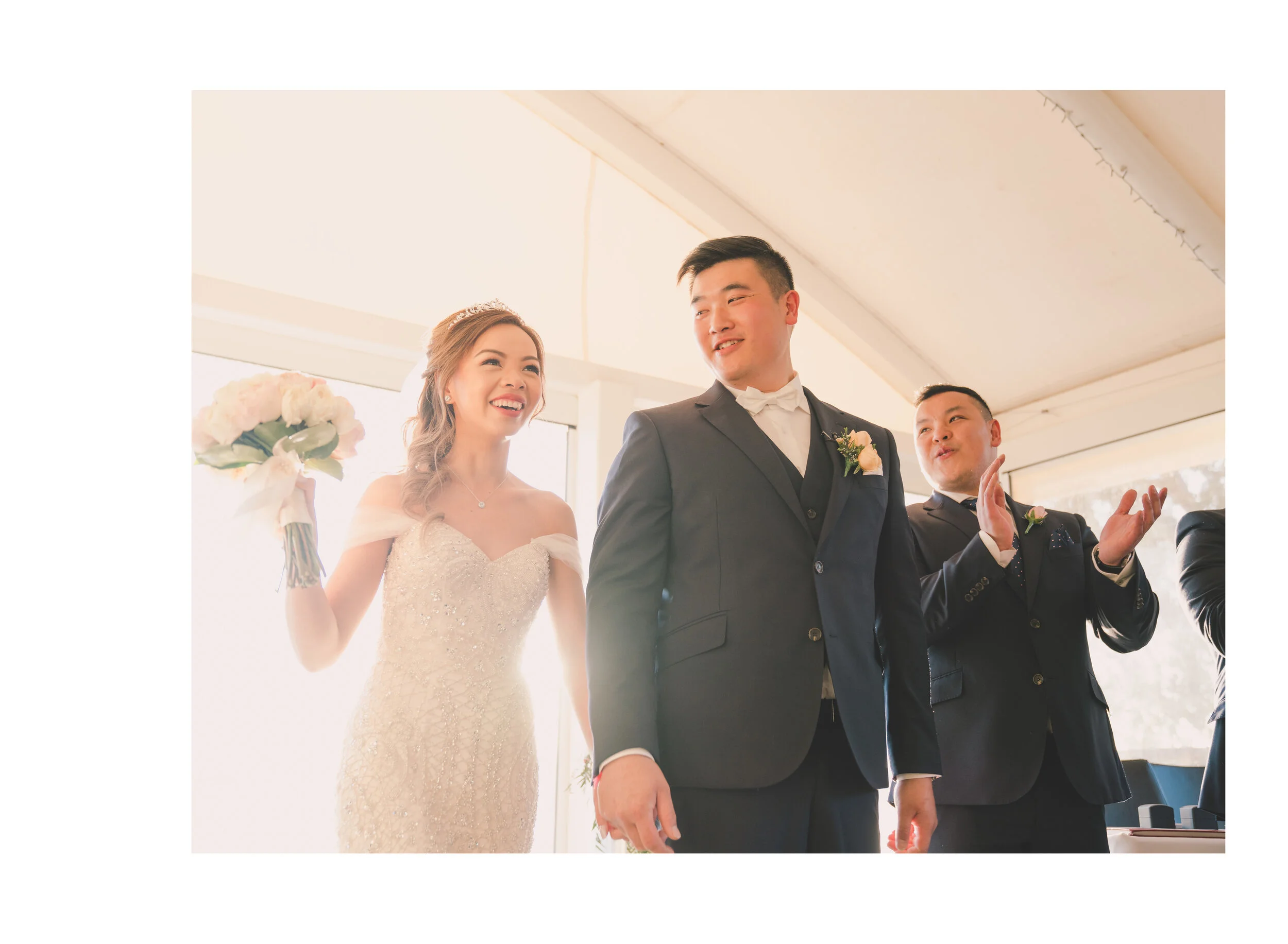 Newlyweds smiling together after their garden ceremony