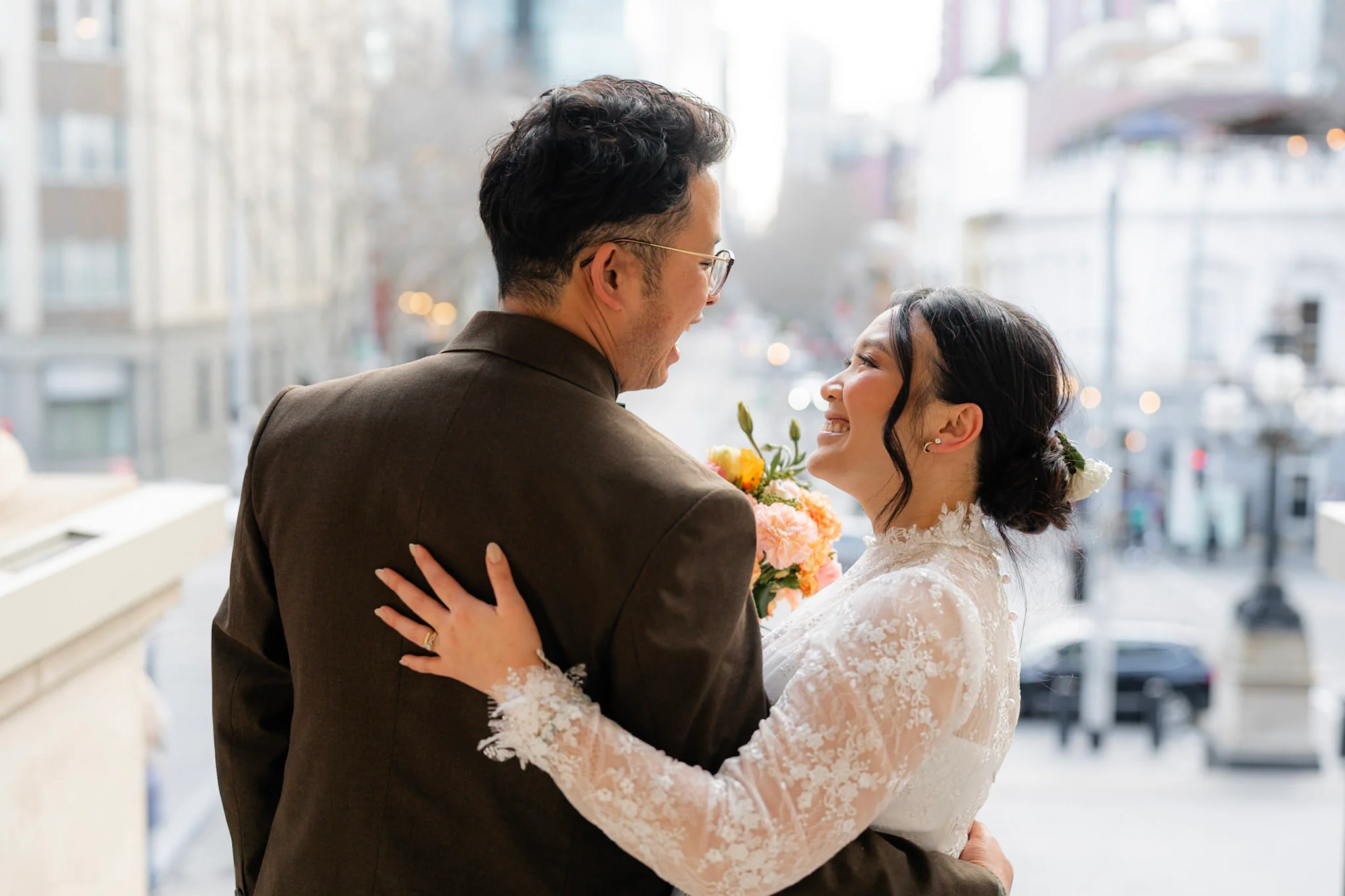 Ron and Joy kissing on a Melbourne city street