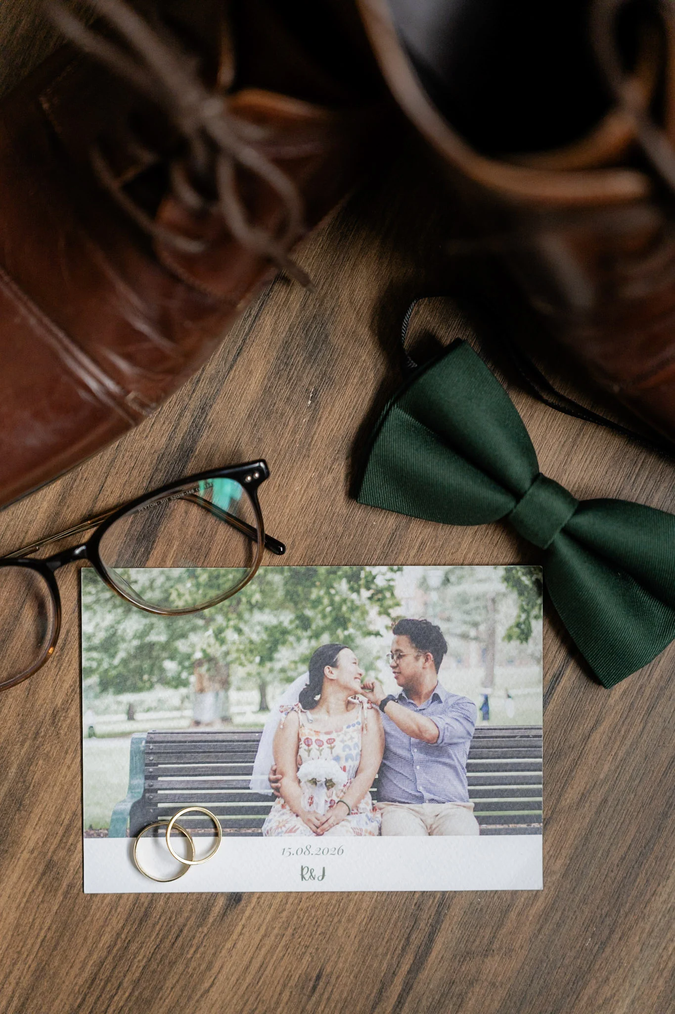 Ron's shoes, bow tie, glasses and a photograph arranged before he gets ready