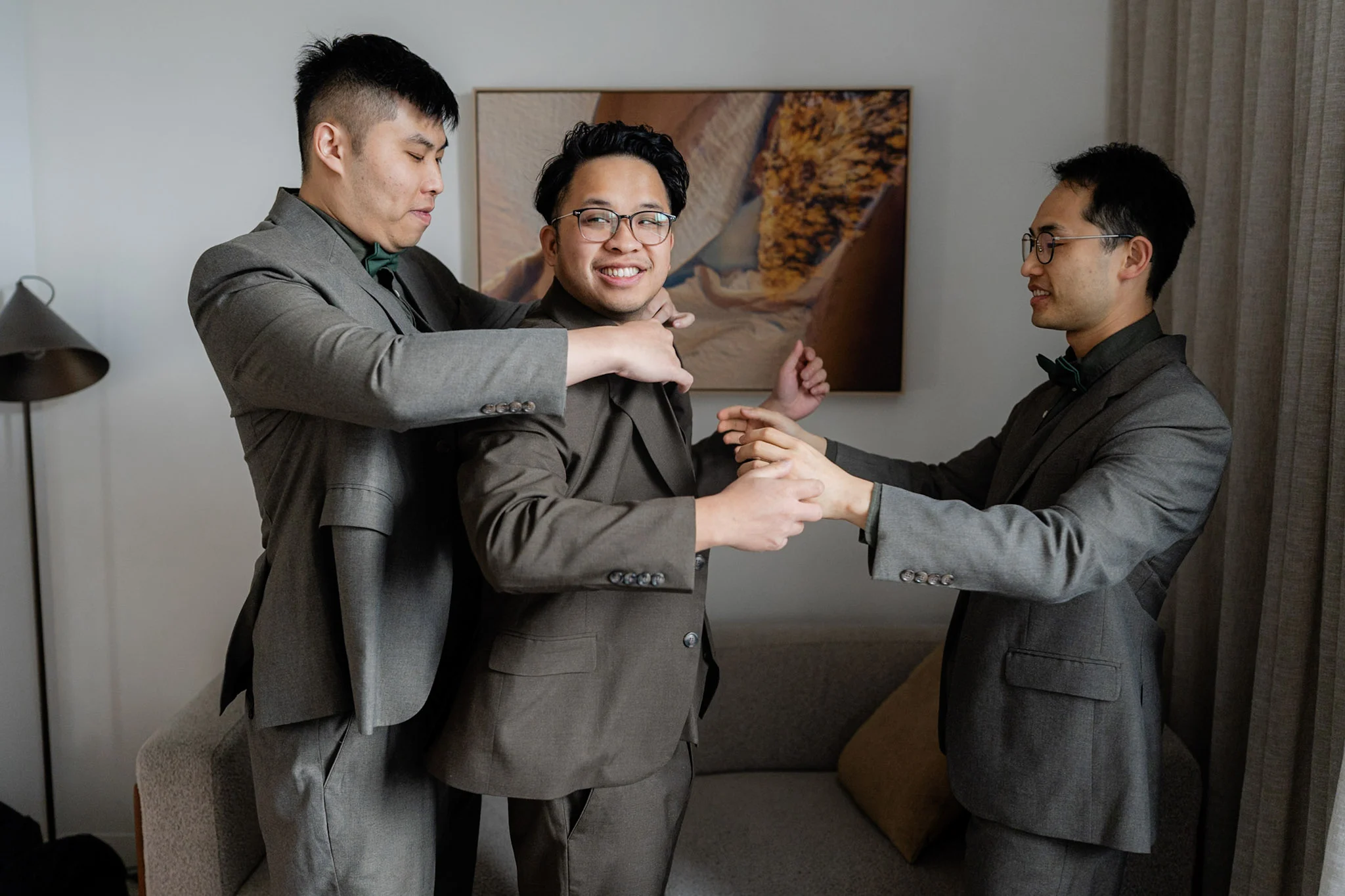 Ron laughing with his groomsmen while they get ready