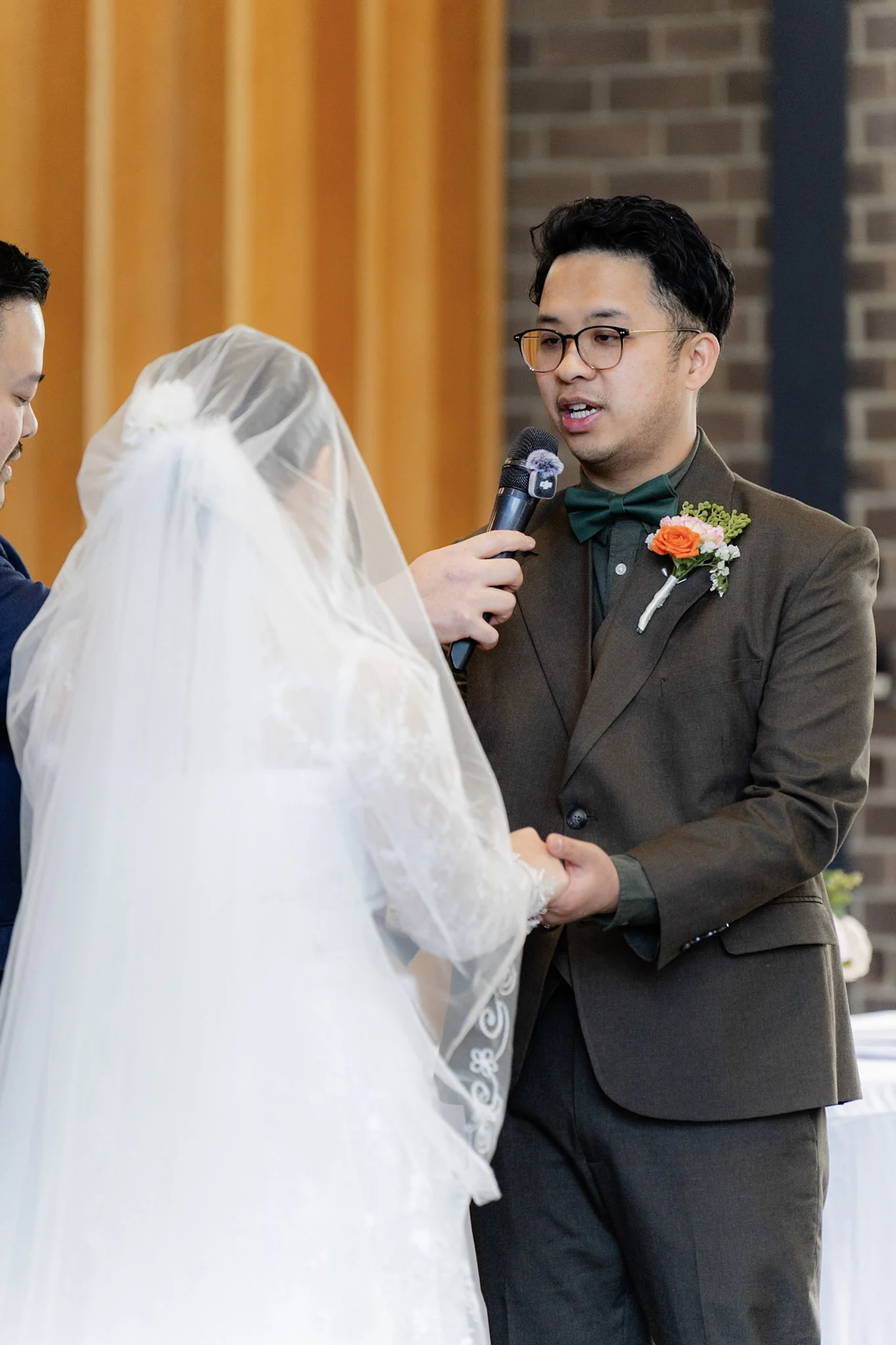 Ron reading his vows to Joy during the ceremony