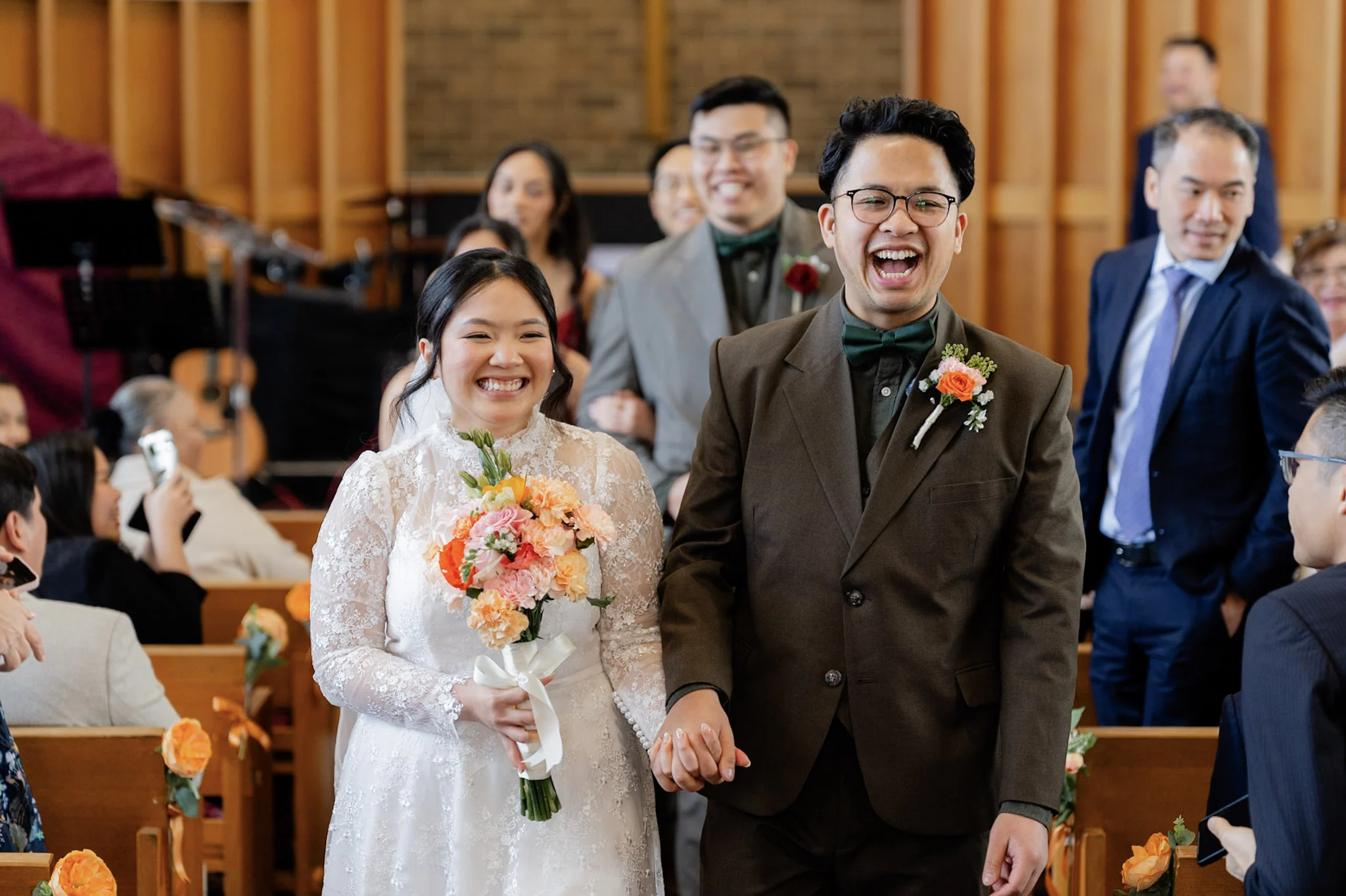 Ron and Joy laughing during their joyful church recessional