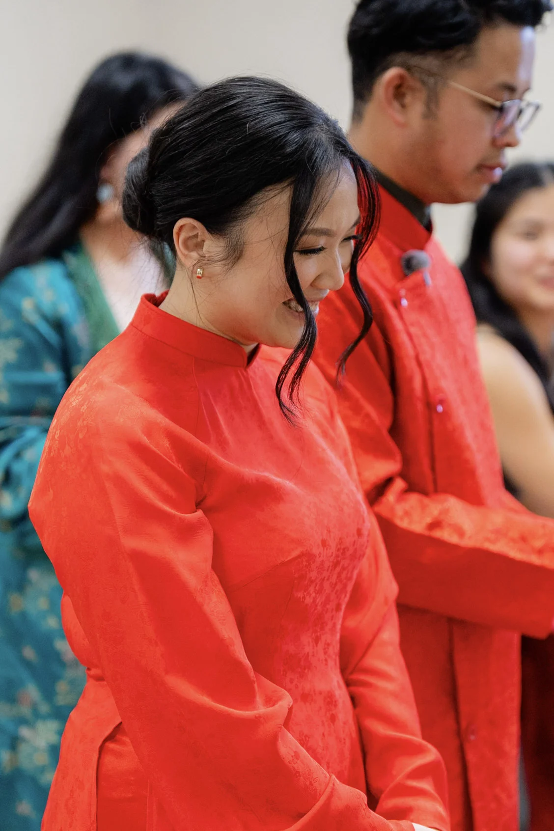 Joy wearing red as she prepares for the tea ceremony