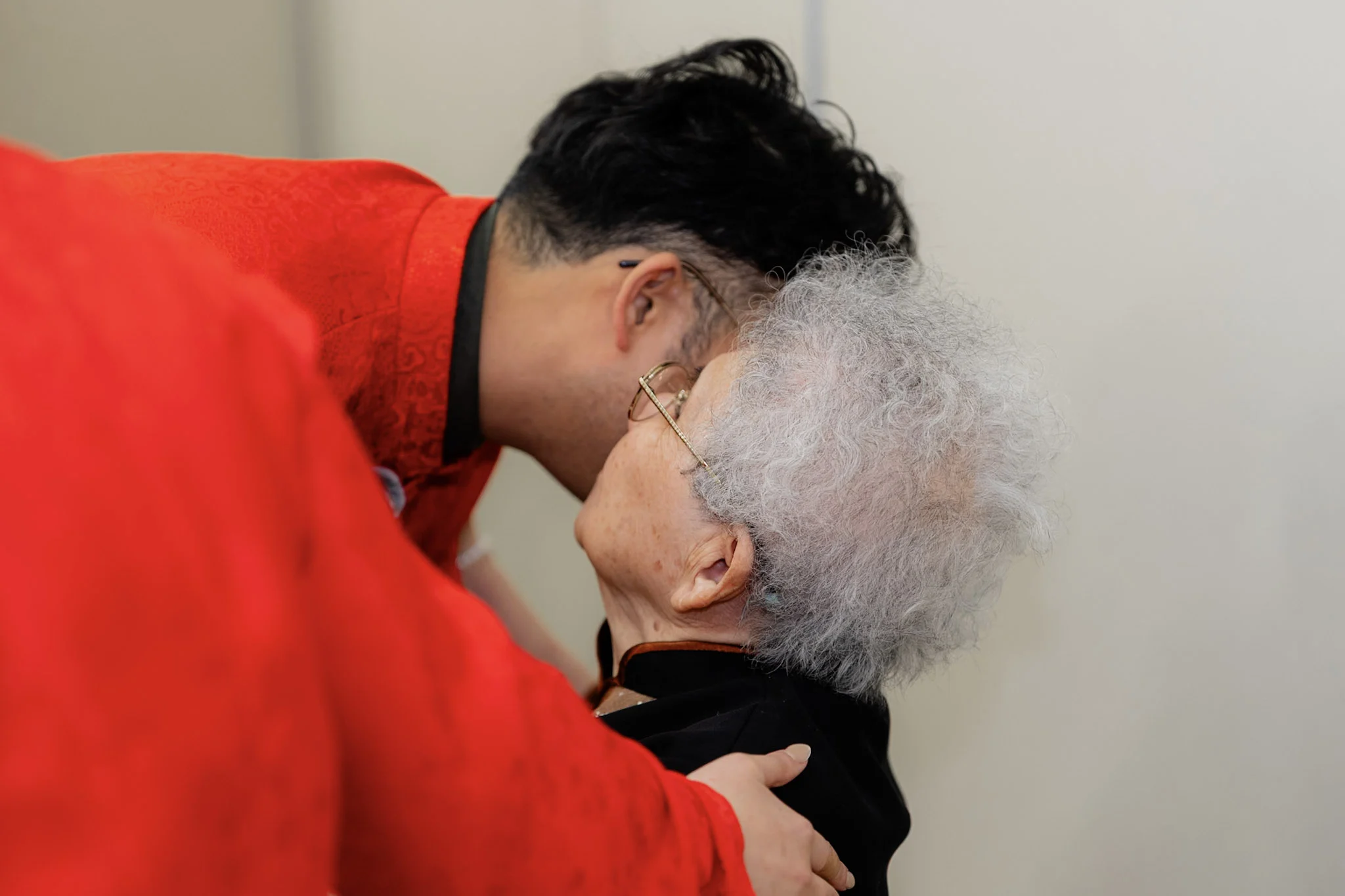 Ron kissing his grandmother during the tea ceremony
