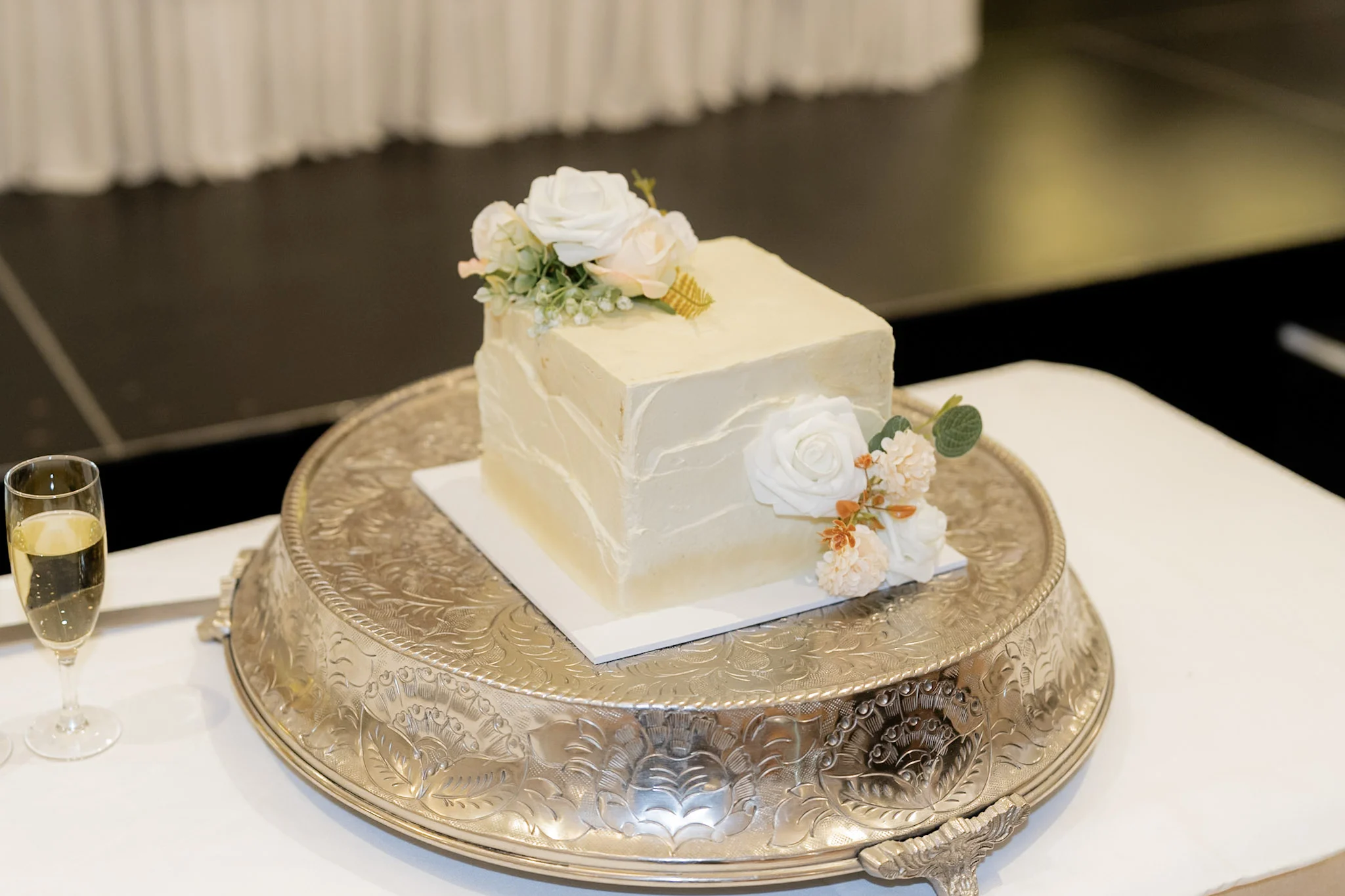 Ron and Joy's floral wedding cake at the reception