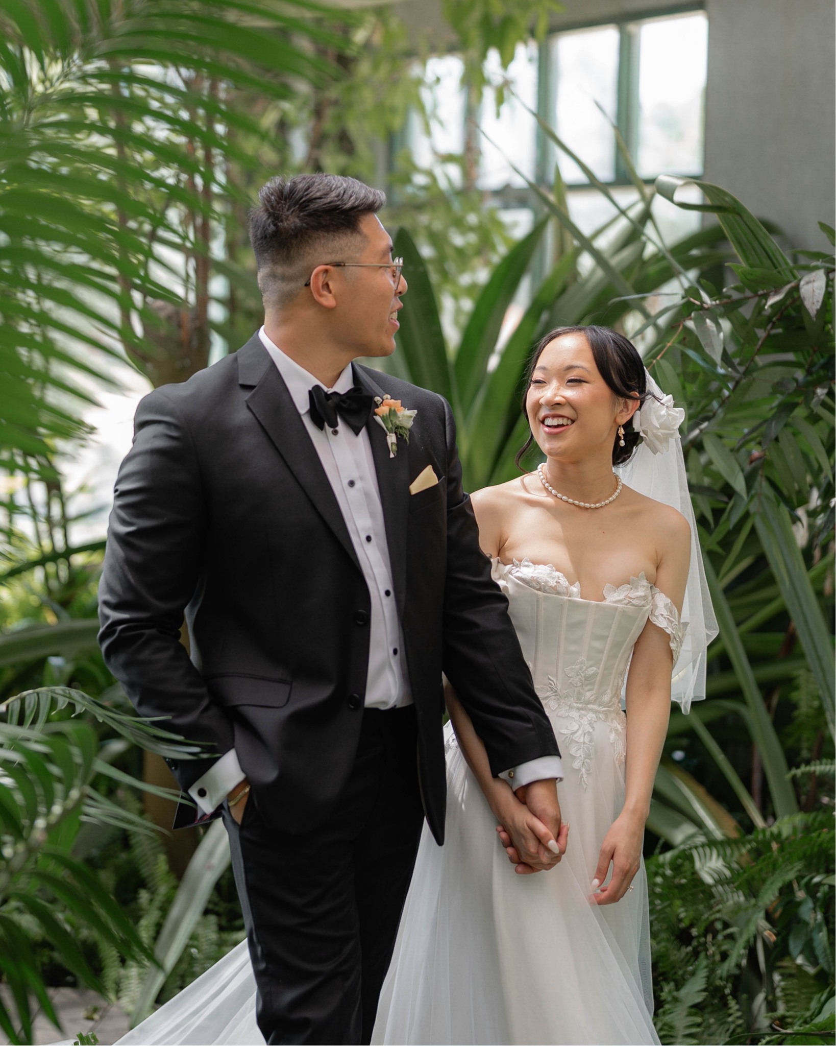 Newly married couple laughing together