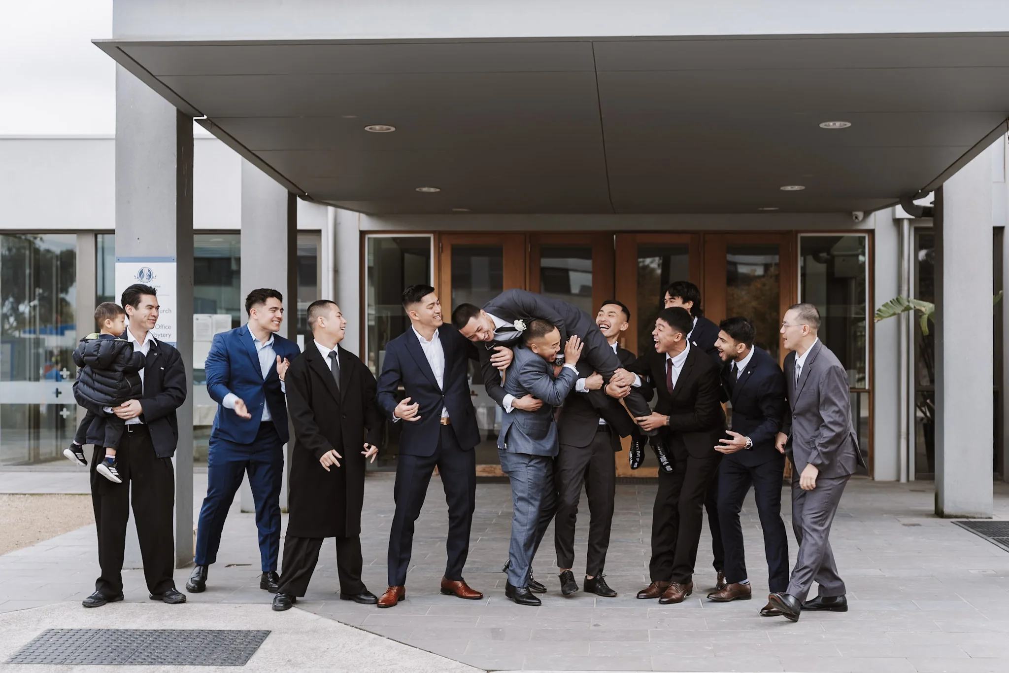 Kevin's group pointing and joking together outside the church